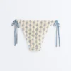 Chiloți de bikini cu acoperire medie, cu legături din croșetat cu model de valuri Chiloți de bikini cu acoperire medie, cu legături din croșetat cu model de valuri