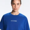 Cămășă scurtă, dreptă, din amestec de bumbac, cu slogan Cămășă scurtă, dreptă, din amestec de bumbac, cu slogan