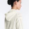 Geci din tricot ajurat cu glugă Geci din tricot ajurat cu glugă