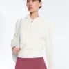 Geci din tricot ajurat cu glugă Geci din tricot ajurat cu glugă