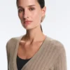 Geci din tricot cu nervuri, cu închidere cu legături laterale Geci din tricot cu nervuri, cu închidere cu legături laterale