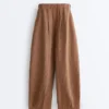 Pantaloni balon din in 100% cu imprimeu în dungi Pantaloni balon din in 100% cu imprimeu în dungi
