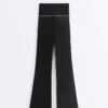 Pantaloni Comfortlux cu talie înaltă și croi evazat, cu fundă Pantaloni Comfortlux cu talie înaltă și croi evazat, cu fundă