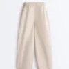 Pantaloni conici plisați din bumbac 100% Pantaloni conici plisați din bumbac 100%