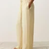 Pantaloni cu croi drept din in 100% cu imprimeu în dungi Pantaloni cu croi drept din in 100% cu imprimeu în dungi