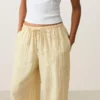 Pantaloni cu croi drept din in 100% cu imprimeu în dungi Pantaloni cu croi drept din in 100% cu imprimeu în dungi