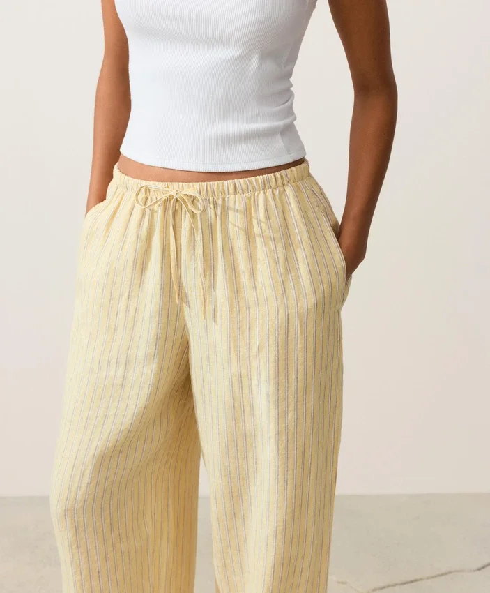 Pantaloni cu croi drept din in 100% cu imprimeu în dungi Pantaloni cu croi drept din in 100% cu imprimeu în dungi