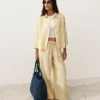 Pantaloni cu croi drept din in 100% cu imprimeu în dungi Pantaloni cu croi drept din in 100% cu imprimeu în dungi