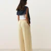 Pantaloni cu croi drept din in 100% cu imprimeu în dungi Pantaloni cu croi drept din in 100% cu imprimeu în dungi