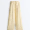 Pantaloni cu croi drept din in 100% cu imprimeu în dungi Pantaloni cu croi drept din in 100% cu imprimeu în dungi