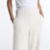 Pantaloni cu talie înaltă, croi larg și dungi fine, cu textură Soft Touch Pantaloni cu talie înaltă, croi larg și dungi fine, cu textură Soft Touch