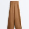 Pantaloni cu talie înaltă și croi larg, cu efect de neopren Pantaloni cu talie înaltă și croi larg, cu efect de neopren