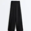 Pantaloni cu talie înaltă și croi larg, cu efect de neopren Pantaloni cu talie înaltă și croi larg, cu efect de neopren