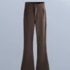 Pantaloni de schi evazați, elastici și rezistenți la apă