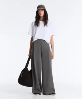 Pantaloni din bumbac piqué cu talie înaltă și croi larg