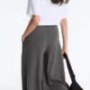 Pantaloni din bumbac piqué cu talie înaltă și croi larg Pantaloni din bumbac piqué cu talie înaltă și croi larg
