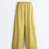 Pantaloni largi din 100% in, cu pli lateral