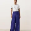 Pantaloni largi din 100% in, cu pli lateral