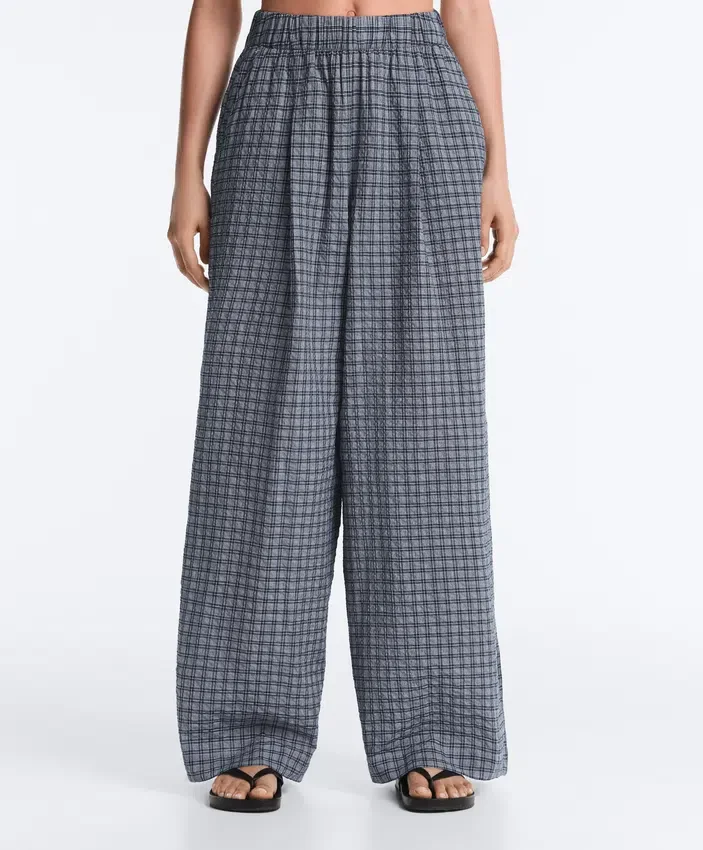 Pantaloni largi din amestec de bumbac cu imprimeu în carouri Pantaloni largi din amestec de bumbac cu imprimeu în carouri
