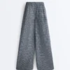 Pantaloni largi din amestec de bumbac cu imprimeu în carouri Pantaloni largi din amestec de bumbac cu imprimeu în carouri
