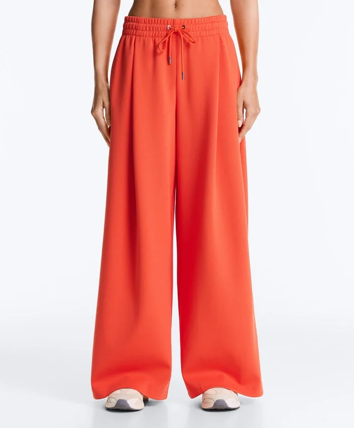 Pantaloni largi din bumbac piqué cu pliuri Pantaloni largi din bumbac piqué cu pliuri