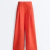 Pantaloni largi din bumbac piqué cu pliuri Pantaloni largi din bumbac piqué cu pliuri