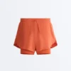 Pantaloni scurți 2-în-1 cu talie medie și textură Light Touch Pantaloni scurți 2-în-1 cu talie medie și textură Light Touch