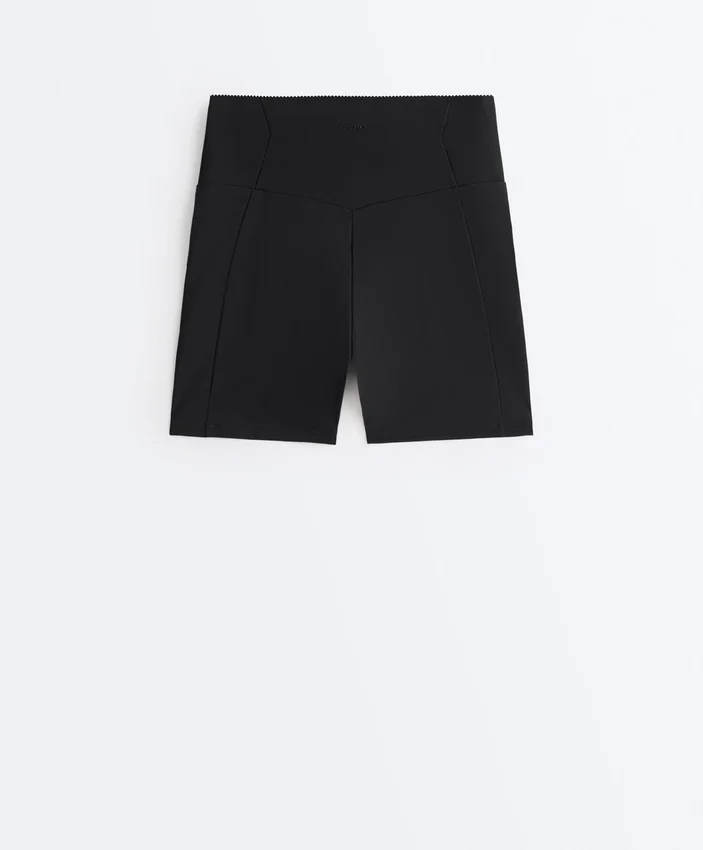 Pantaloni scurți de 10 cm cu talie înaltă și buzunar compresiv Pantaloni scurți de 10 cm cu talie înaltă și buzunar compresiv