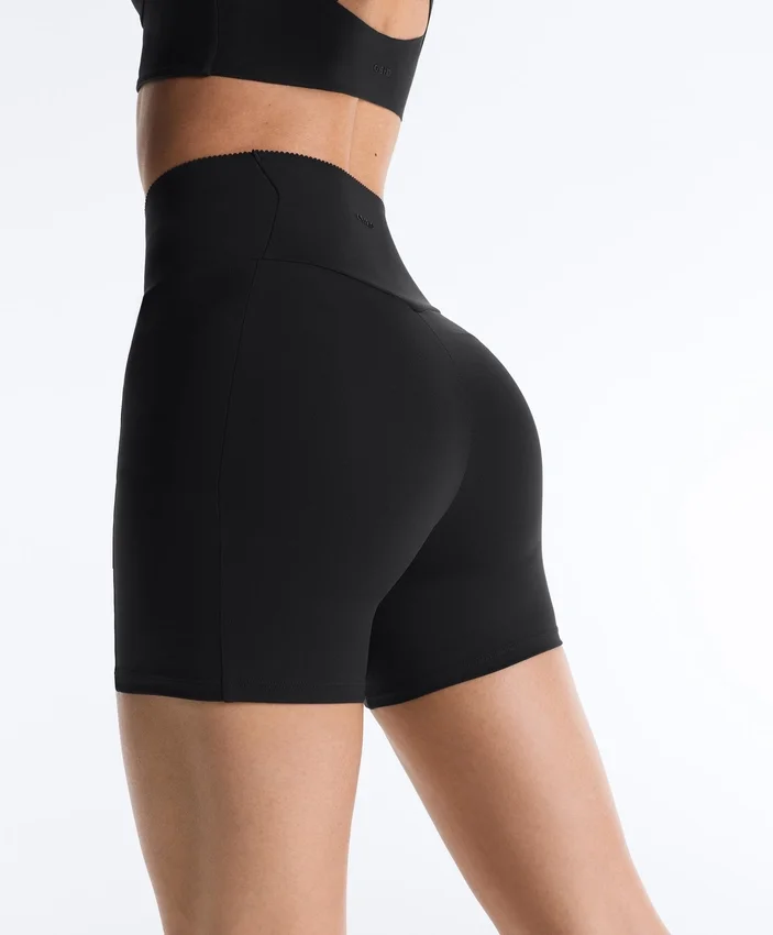 Pantaloni scurți de 10 cm cu talie înaltă și buzunar compresiv Pantaloni scurți de 10 cm cu talie înaltă și buzunar compresiv