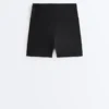 Pantaloni scurți de 10 cm cu talie înaltă și buzunar compresiv Pantaloni scurți de 10 cm cu talie înaltă și buzunar compresiv