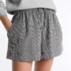 Pantaloni scurți din amestec de lyocell cu imprimeu în carouri Pantaloni scurți din amestec de lyocell cu imprimeu în carouri