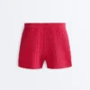 Pantaloni scurți din tricot spălat cu model împletit Pantaloni scurți din tricot spălat cu model împletit