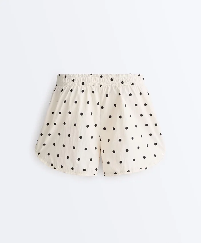 Pantaloni scurți tehnici cu buline Pantaloni scurți tehnici cu buline
