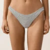 Slip de chiloți de bikini cu decupaj în U, acoperire medie, din țesătură jacquard cu buline Slip de chiloți de bikini cu decupaj în U, acoperire medie, din țesătură jacquard cu buline