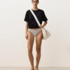Slip de chiloți de bikini cu decupaj în U, acoperire medie, din țesătură jacquard cu buline Slip de chiloți de bikini cu decupaj în U, acoperire medie, din țesătură jacquard cu buline