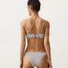 Slip de chiloți de bikini cu decupaj în U, acoperire medie, din țesătură jacquard cu buline Slip de chiloți de bikini cu decupaj în U, acoperire medie, din țesătură jacquard cu buline