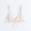 Top de bikini triunghiular cu textură în dungi și decolteu halter
