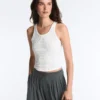 Tricou fără mâneci, fără cusături, cu smocuri Tricou fără mâneci, fără cusături, cu smocuri