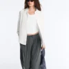 Tricou fără mâneci, fără cusături, cu smocuri Tricou fără mâneci, fără cusături, cu smocuri