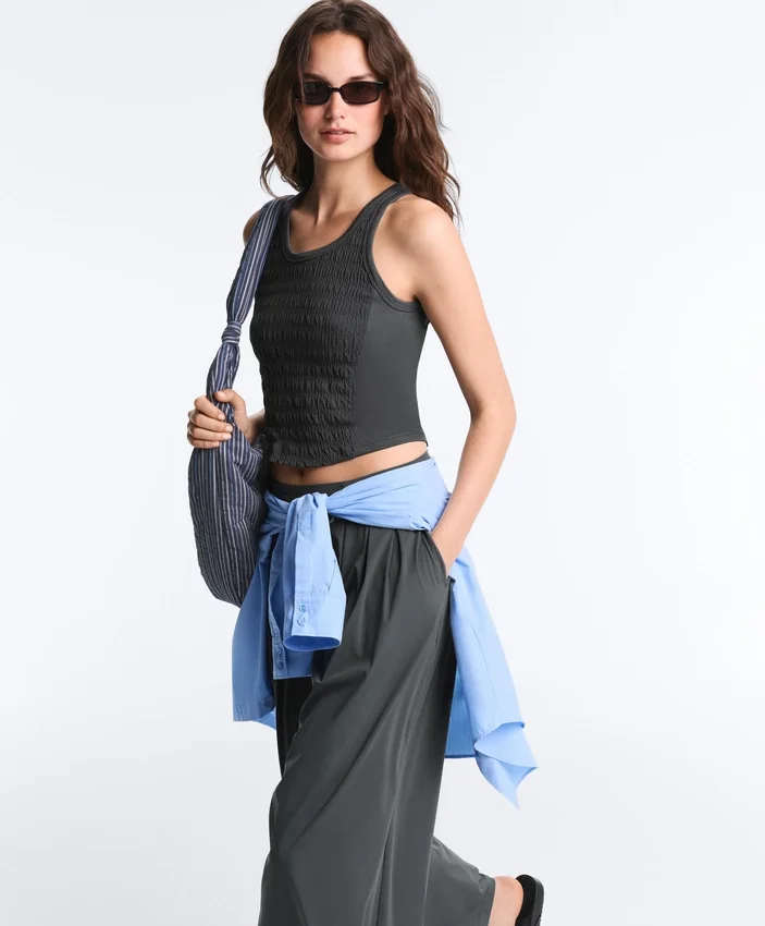 Tricou fără mâneci, fără cusături, cu smocuri Tricou fără mâneci, fără cusături, cu smocuri