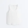 Tricou fără mâneci, fără cusături, cu smocuri Tricou fără mâneci, fără cusături, cu smocuri