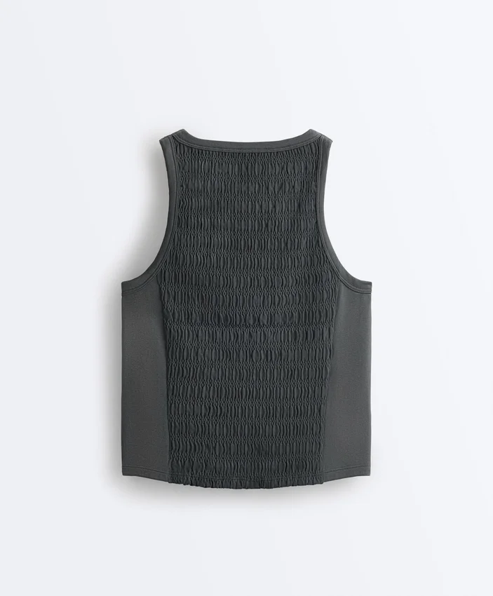 Tricou fără mâneci, fără cusături, cu smocuri Tricou fără mâneci, fără cusături, cu smocuri