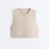 Veste matlasată cu imprimeu floral în carouri Veste matlasată cu imprimeu floral în carouri