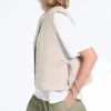 Veste matlasată cu imprimeu floral în carouri Veste matlasată cu imprimeu floral în carouri